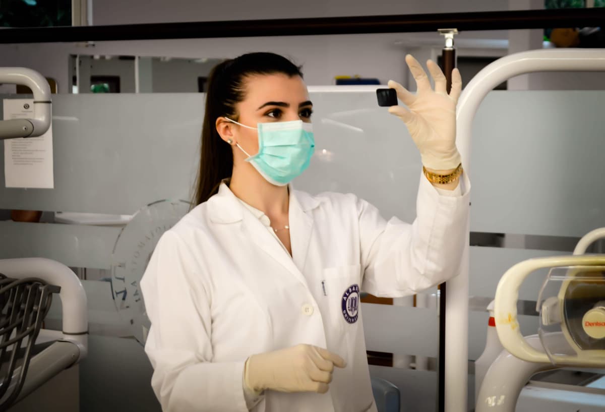 usmle woman in lab holding a sample usmle woman in lab holding a sample
